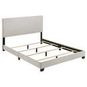  Coaster Furniture Dorian 300852Q Fabric Upholstered Queen Panel Bed - Cream IMAGE 1
